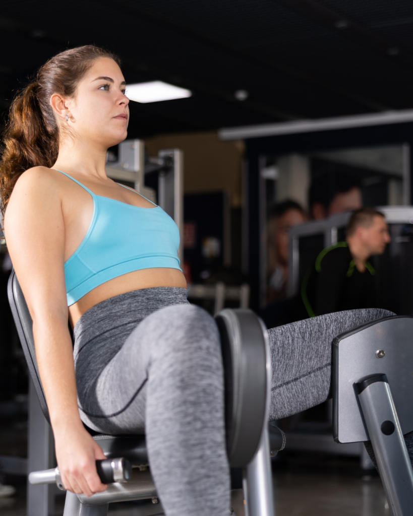 ρήξη προσαγωγών woman at the gym